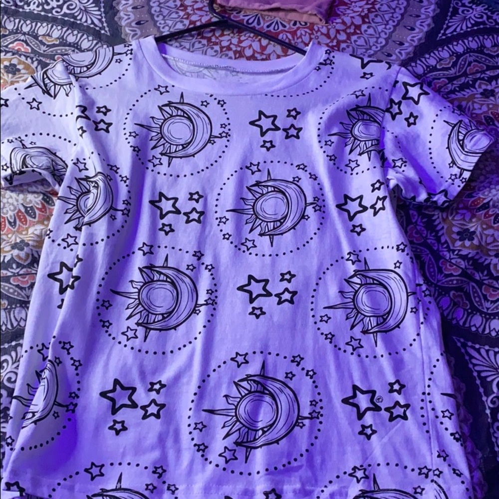 Plain white tee shirt with moon, sun & star design